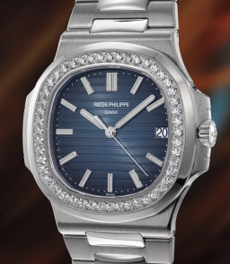 Sample photo of patek-philippe5713/1g-001 at Phillips The Geneva Watch Auction: XIX featuring the Guido Mondani Collection