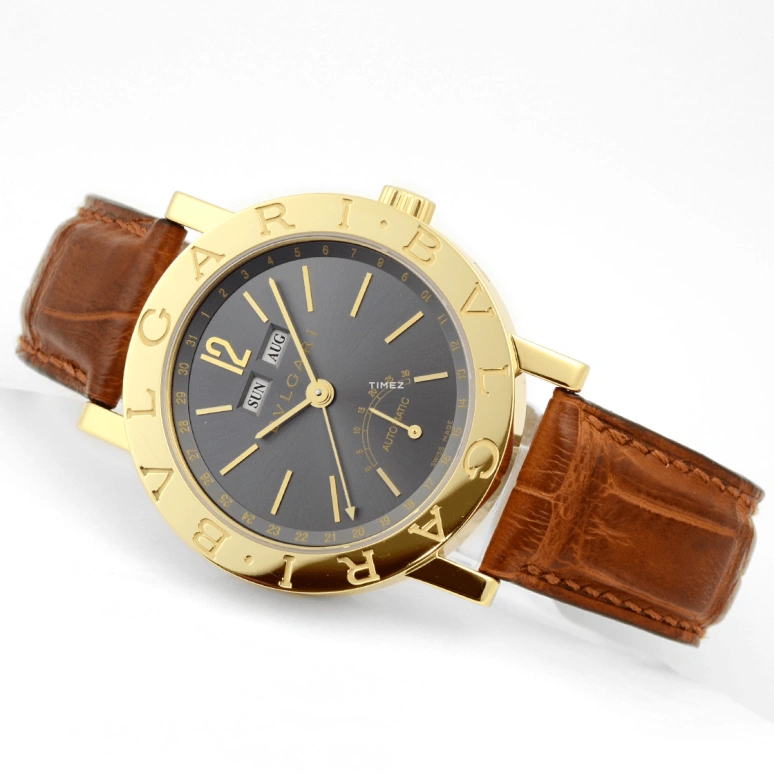 Bulgari,Bulgari Bulgari 38mm,38mm,Yellow Gold,Grey,Automatic,Month,Date,Day,Power Reserve Indicator,Sapphire,Crystal Glass,Round,BB38GLSR,BB38GLSR/C5
