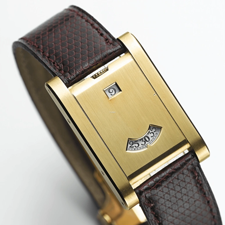 Cartier,Tank à Guichet 24.50x35.50mm,24.50x35.50mm,Yellow Gold,White,Handwound,Jumping Minutes,Jumping Hours,2817