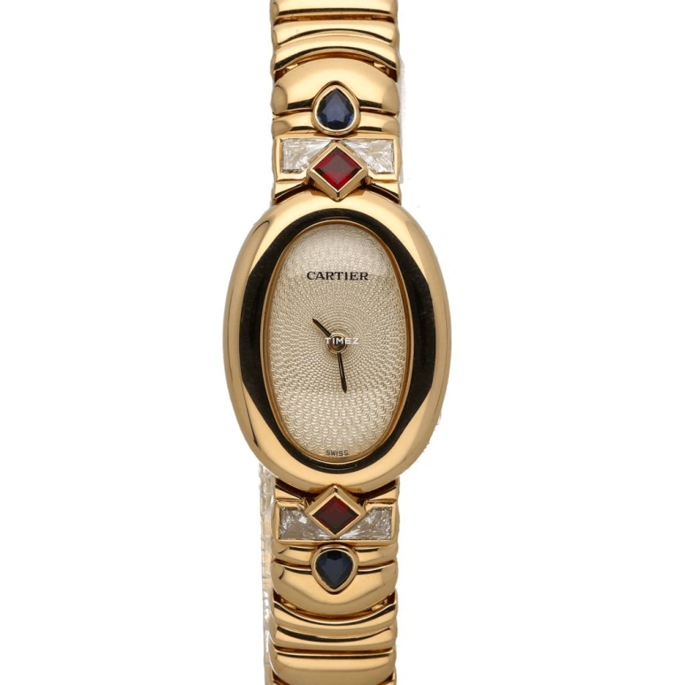 Cartier,Baignoire 18mm,18mm,Yellow Gold,Cream white,Quartz,Sapphire,Oval,Timothée Chalamet,1960