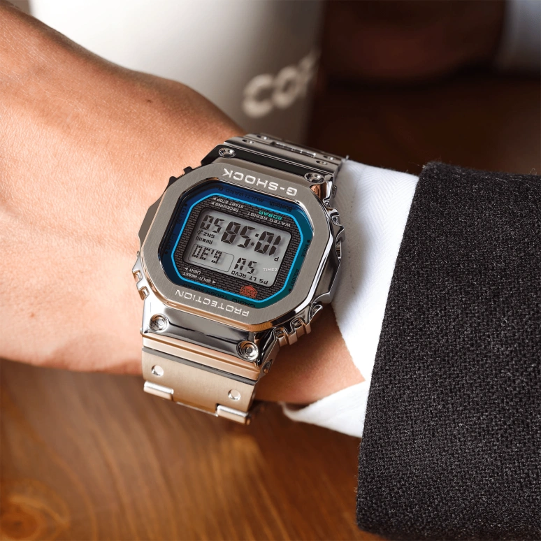Casio,G-SHOCK 49.30x43.20mm,49.30x43.20mm,Stainless Steel,Silver,Quartz,Countdown,Chronograph,Month,Date,Glass,Square,GMW,GMW-B5000PC-1