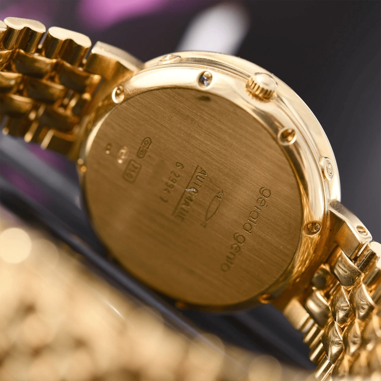 Gérald Genta,Other 33mm,33mm,Yellow Gold,White,Automatic,Moonphase,Perpetual Calendar,Leap Year,Month,Sapphire,Crystal Glass,Round,G2994