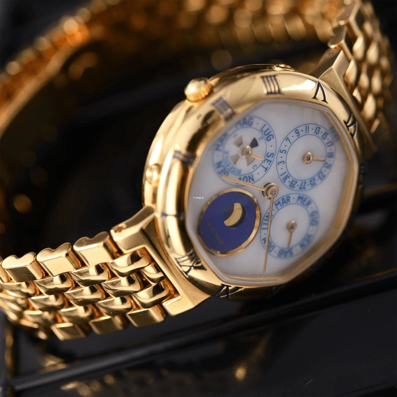 Gérald Genta,Other 33mm,33mm,Yellow Gold,White,Automatic,Moonphase,Perpetual Calendar,Leap Year,Month,Sapphire,Crystal Glass,Round,G2994