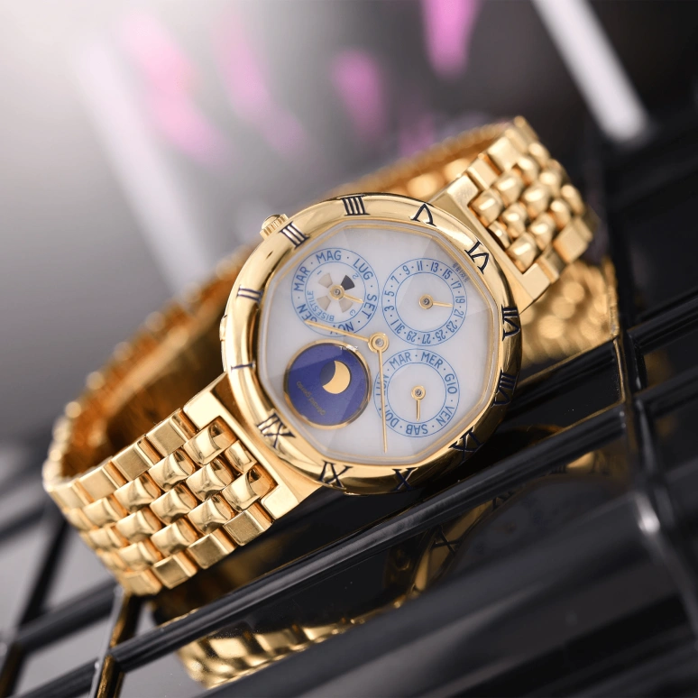Gérald Genta,Other 33mm,33mm,Yellow Gold,White,Automatic,Moonphase,Perpetual Calendar,Leap Year,Month,Sapphire,Crystal Glass,Round,G2994