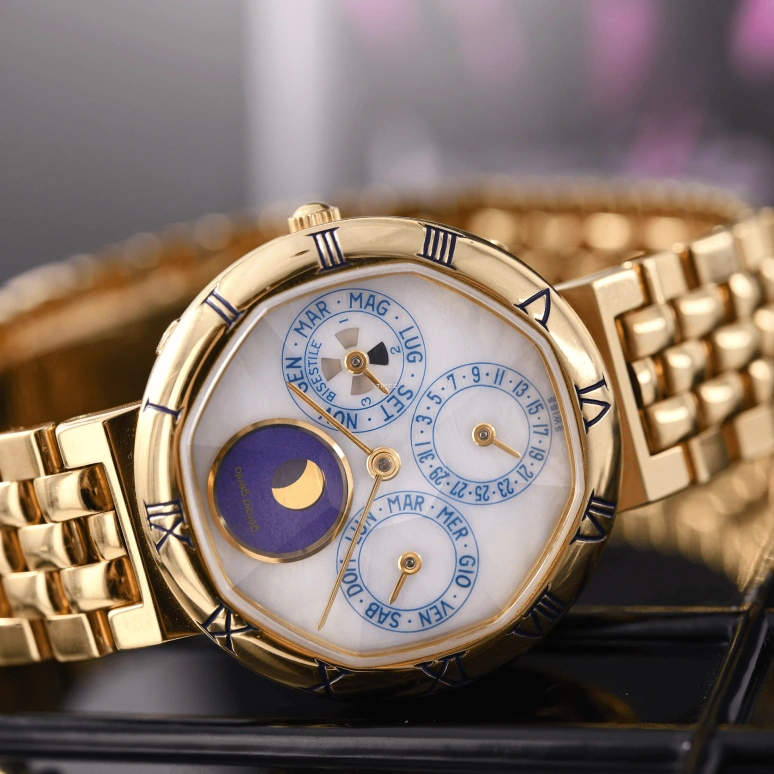 Gérald Genta,Other 33mm,33mm,Yellow Gold,White,Automatic,Moonphase,Perpetual Calendar,Leap Year,Month,Sapphire,Crystal Glass,Round,G2994
