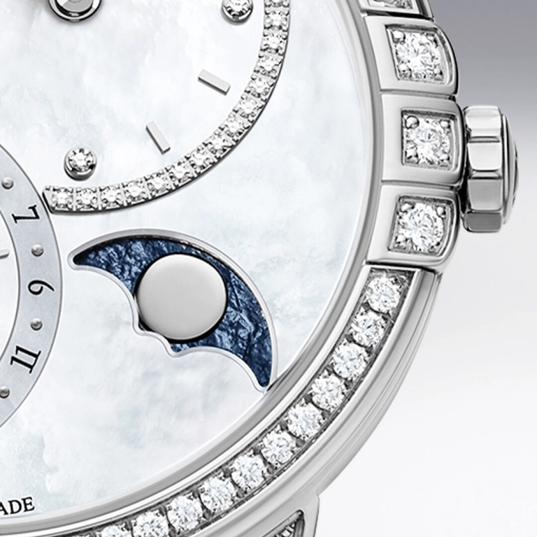 Harry Winston,Midnight 36mm,36mm,Gold,White Gold,White,Automatic,In-house Caliber,Mother of Pearl,MIDAMP36WW001