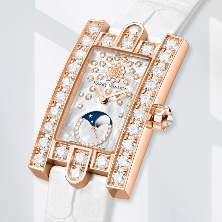 Harry Winston,The Avenue 21.4x36.1mm,21.4x36.1mm,Gold,White Gold,White,Quartz,In-house Caliber,Gold,Mother of Pearl,Emerald,AVEQMP21WW010
