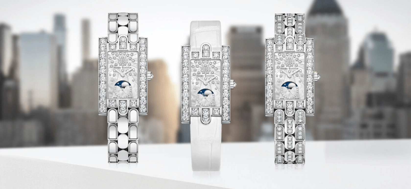 Harry Winston,The Avenue 21.4x36.1mm,21.4x36.1mm,Gold,White Gold,White,Quartz,In-house Caliber,Gold,Mother of Pearl,Emerald,AVEQMP21WW010