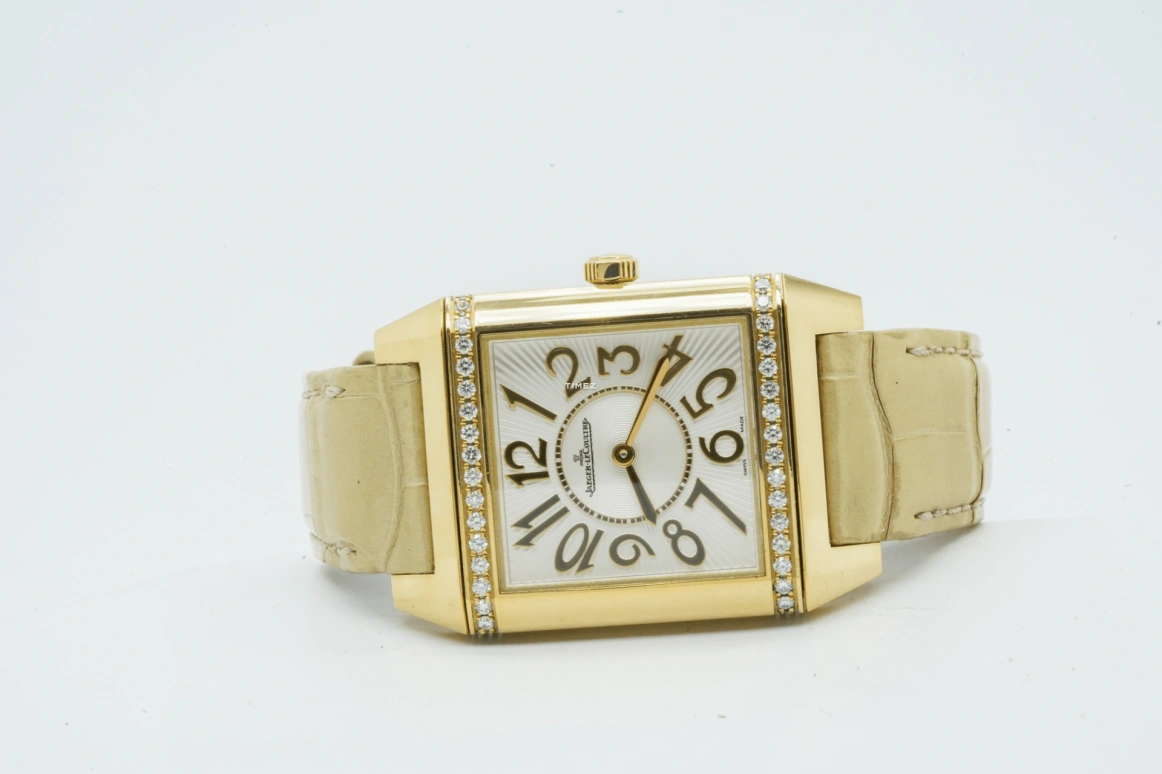 Jaeger-LeCoultre,Reverso 42x28.80mm,42x28.80mm,Yellow Gold,Silver,Quartz,In-house Caliber,Sapphire,Crystal Glass,Q7031420