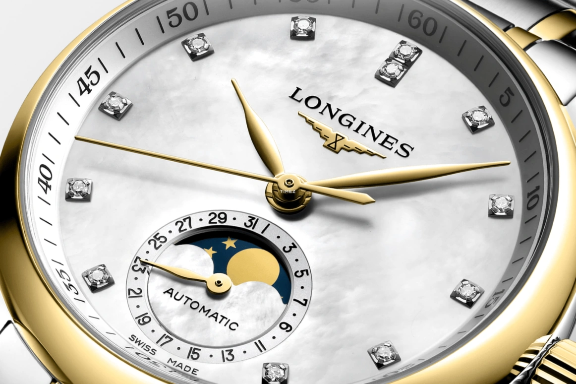 Longines,Master 34mm,34mm,Stainless Steel,Yellow Gold,White,Automatic,Moonphase,Day,L2,L2.409.5.87.7