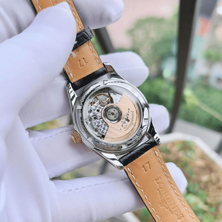 Longines,Conquest Classic 34mm,34mm,Stainless Steel,Rose Gold,Black,Automatic,Day,72hours,L2,L2.385.5.56.3