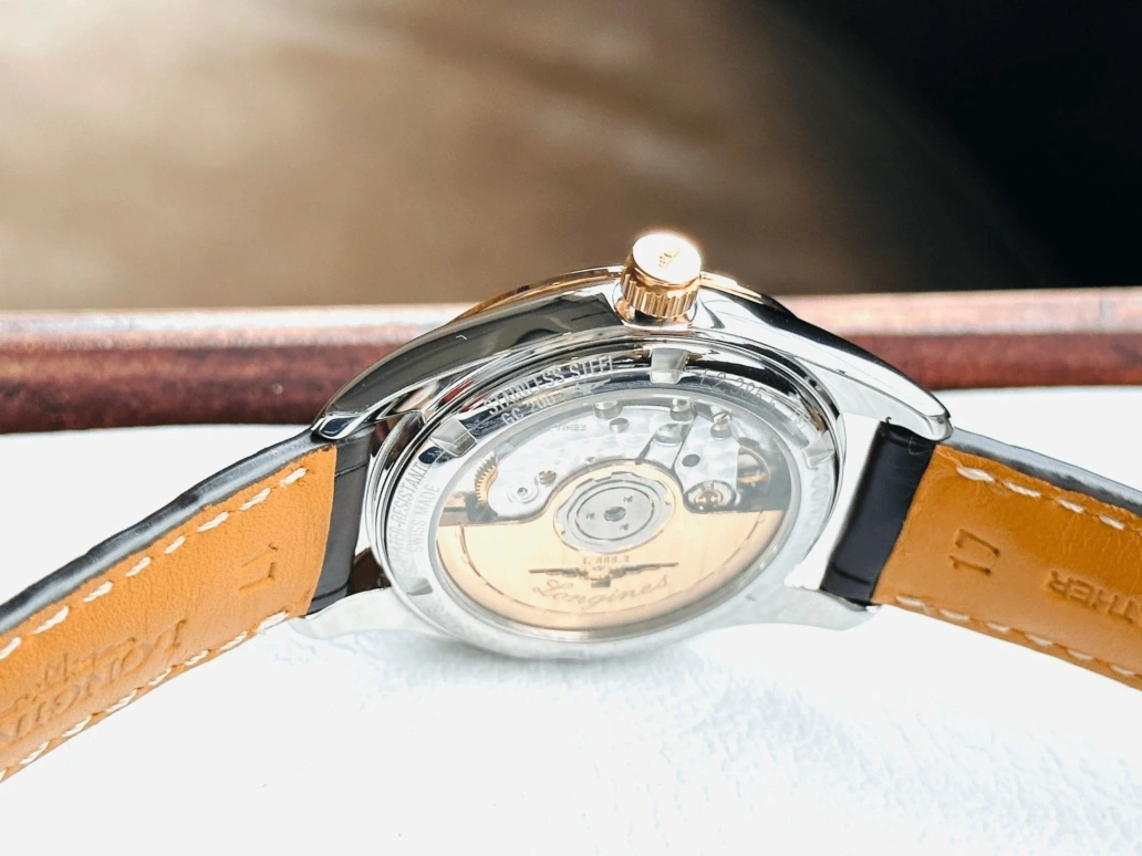 Longines,Conquest Classic 34mm,34mm,Stainless Steel,Rose Gold,White,Automatic,Day,65hours,L2,L2.385.5.76.3