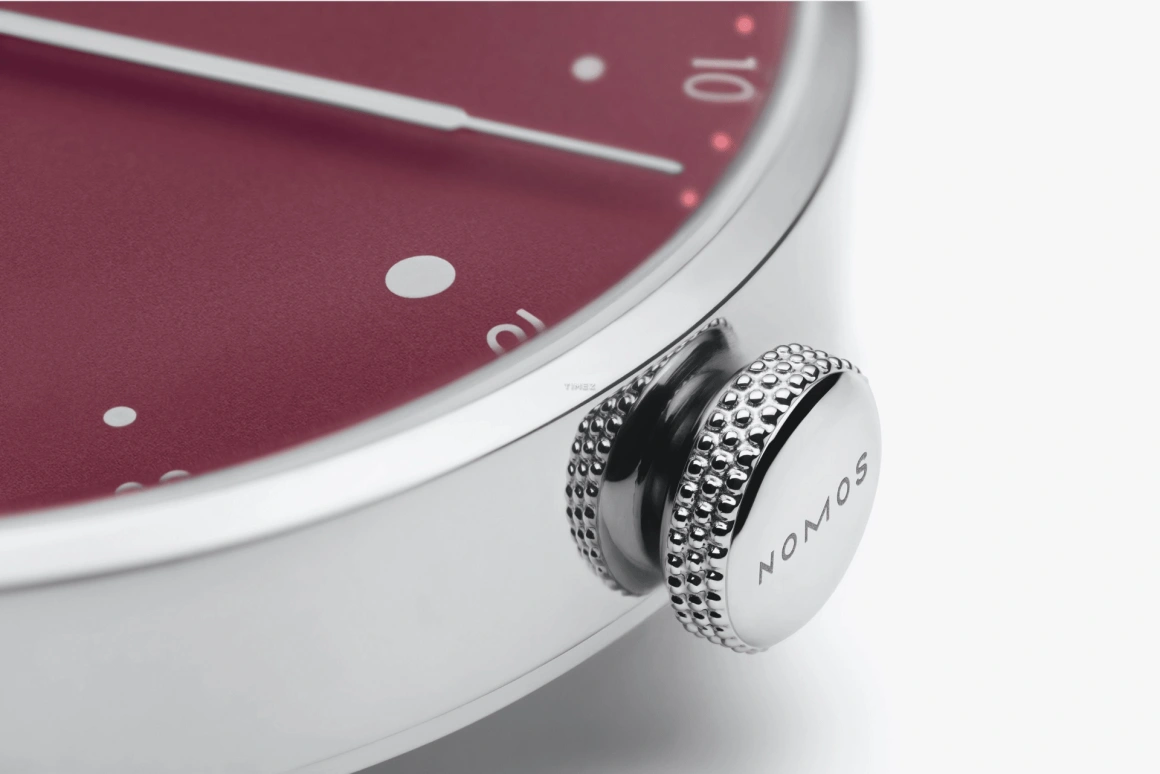 Nomos Glashütte,Metro 33mm,33mm,Stainless Steel,Red,Handwound,43hours,In-house Caliber,1123