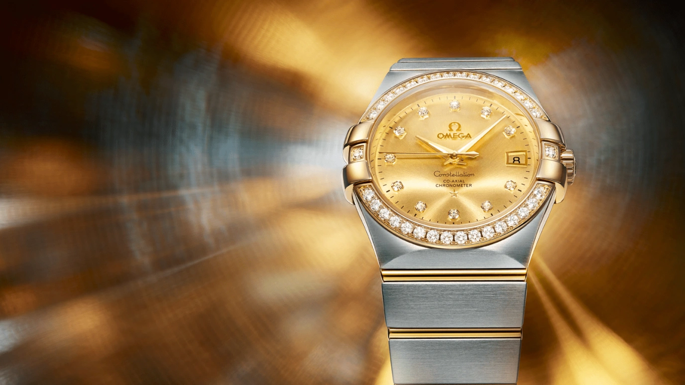 Omega,Constellation 35mm,35mm,Yellow Gold,Stainless Steel,Champagne,Automatic,Date,Co-Axial Escapement,123,123.25.35.20.58.001
