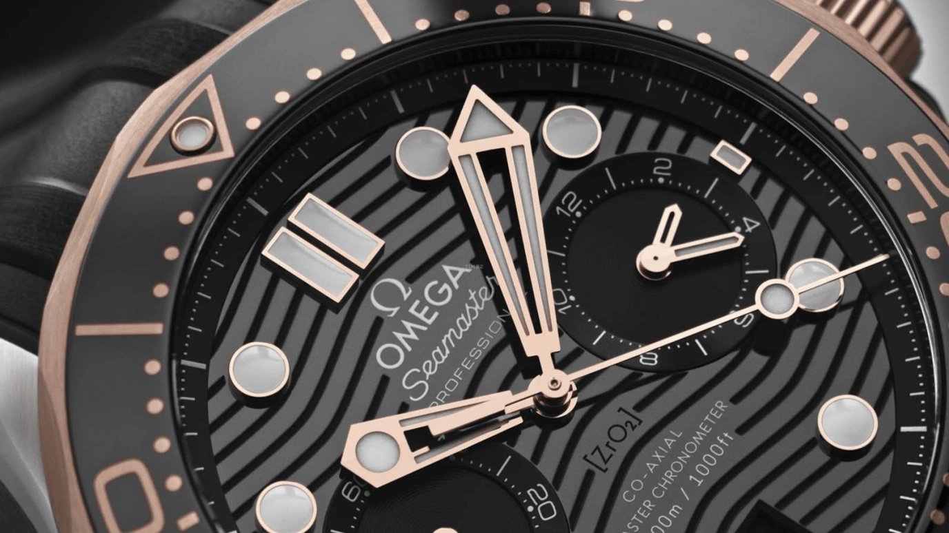 Omega,Seamaster Diver 300M 44mm,44mm,Sedna Gold,Stainless Steel,Black,Automatic,Chronograph,Date,Co-Axial Escapement,Column Wheel,60hours,In-house Caliber,210,210.22.44.51.01.001