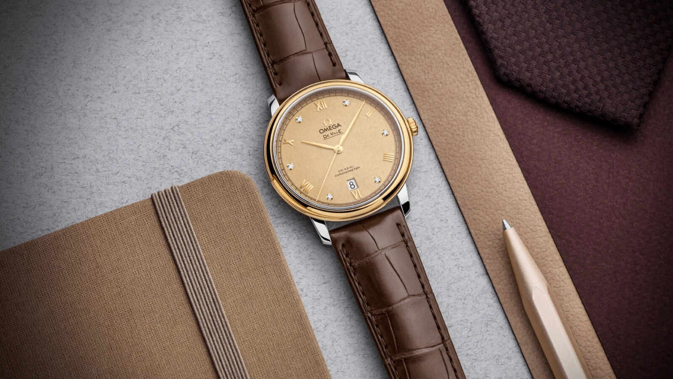 Omega,De Ville 39.50mm,39.50mm,Yellow Gold,Stainless Steel,Champagne,Automatic,Date,Co-Axial Escapement,424,424.23.40.20.58.002