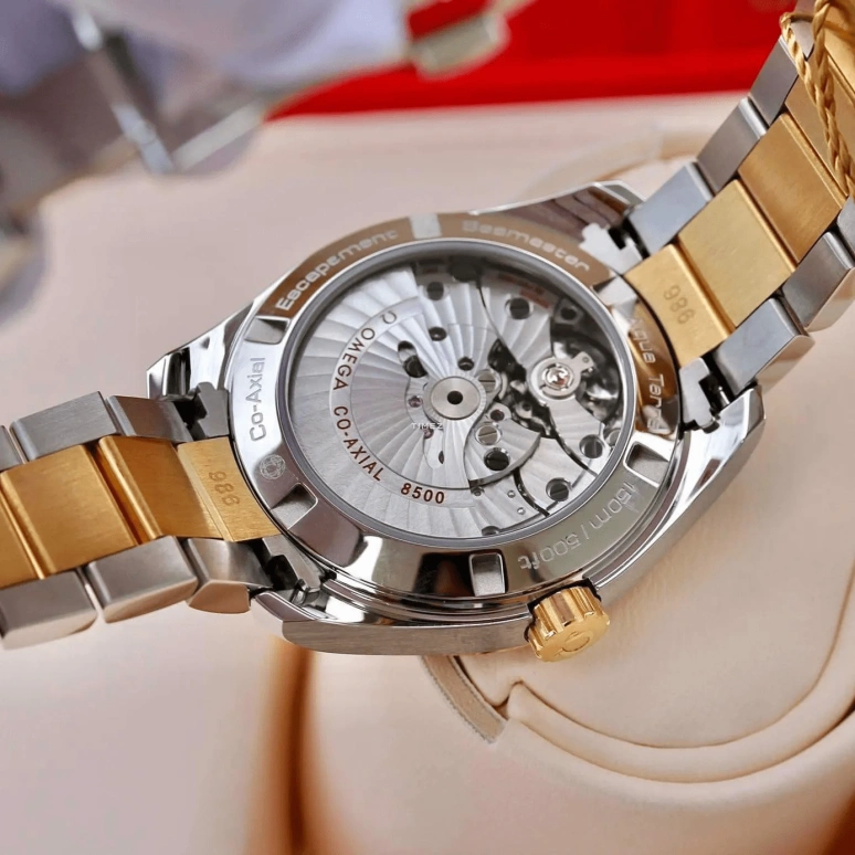 Omega,Aqua Terra 38.50mm,38.50mm,Yellow Gold,Stainless Steel,Black,Automatic,Day,60hours,231,231.25.39.21.51.002