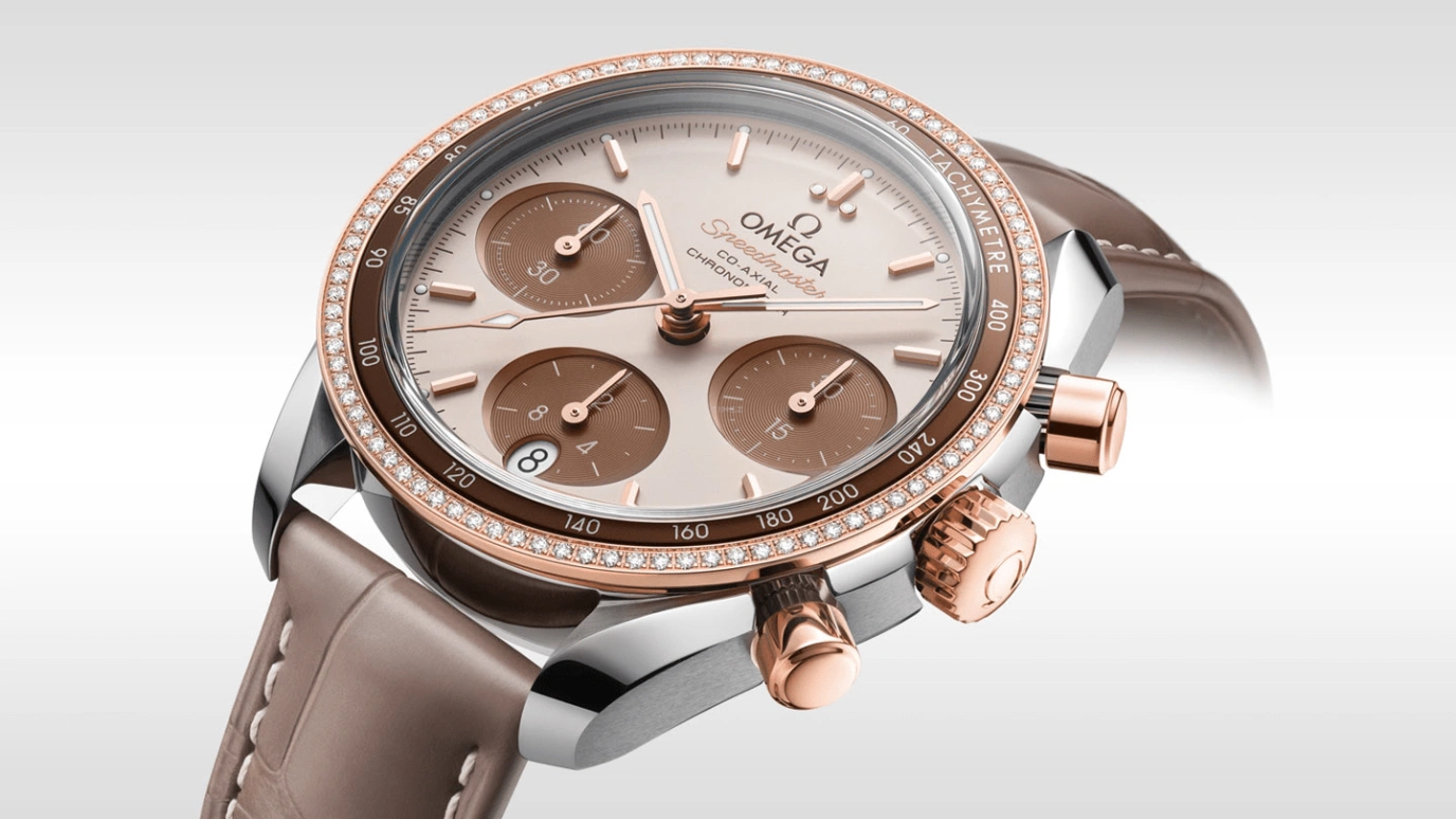Omega,Speedmaster (Non-Moonwatch) 38mm,38mm,Sedna Gold,Stainless Steel,Beige,Automatic,Chronograph,Date,Co-Axial Escapement,Column Wheel,52hours,In-house Caliber,324,324.28.38.50.02.002