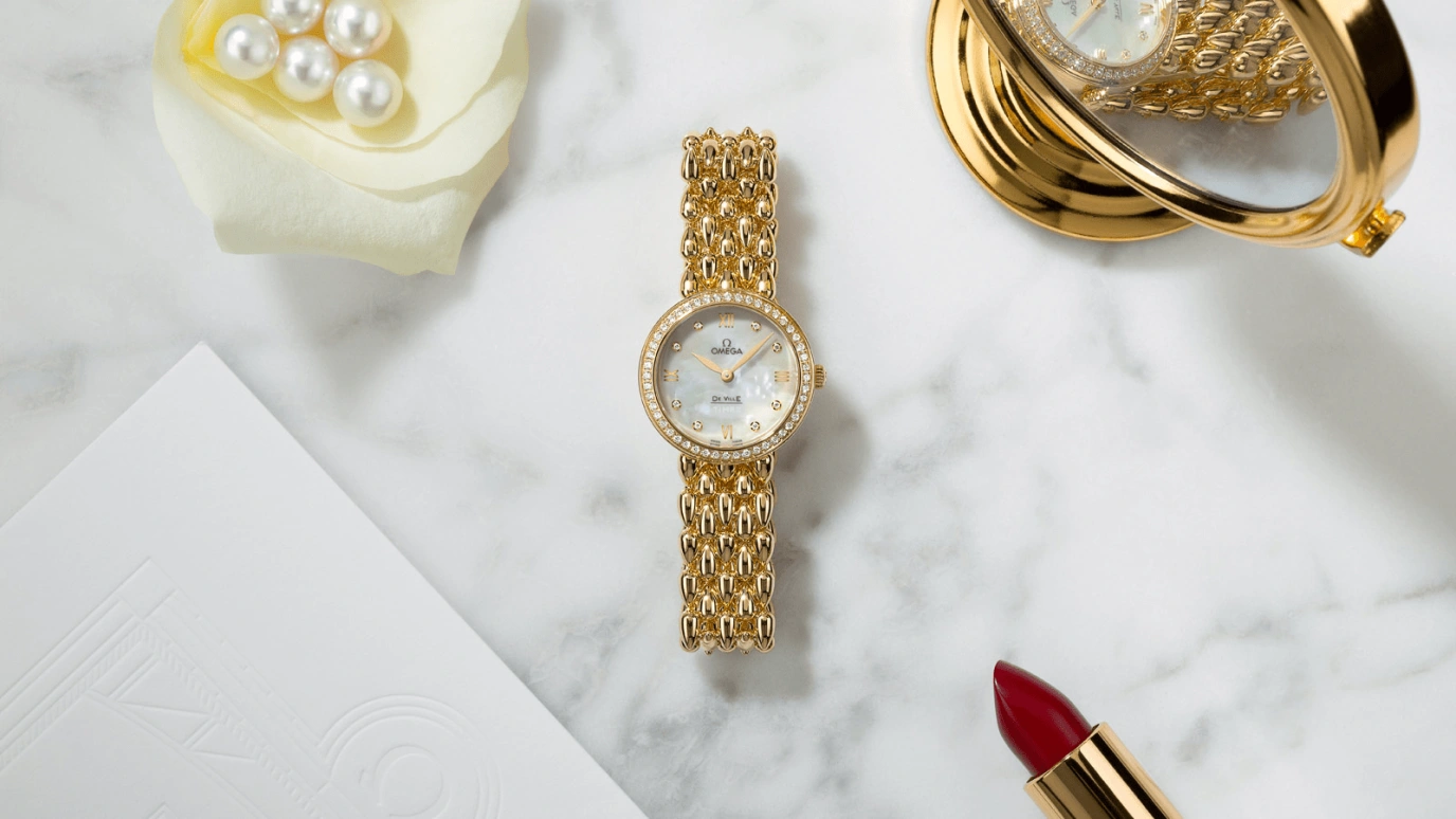 Omega,De Ville 27.40mm,27.40mm,Yellow Gold,White,Quartz,Day,Zodiac Indications,424,424.55.27.60.55.006
