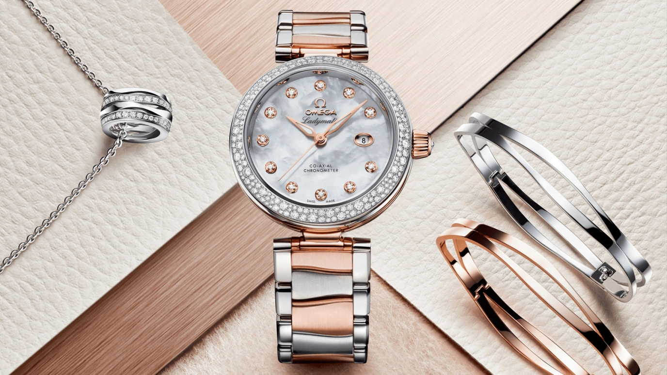 Omega,LadyMatic 34mm,34mm,Sedna Gold,Stainless Steel,White,Automatic,Date,Zodiac Indications,Co-Axial Escapement,425,425.25.34.20.55.004