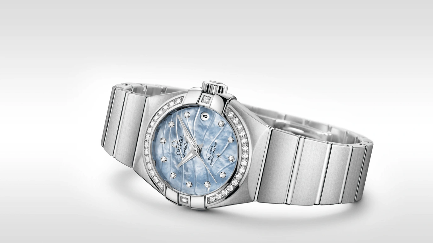 Omega,Constellation 27mm,27mm,Stainless Steel,Blue,Automatic,Date,Zodiac Indications,Co-Axial Escapement,123,123.15.27.20.57.001