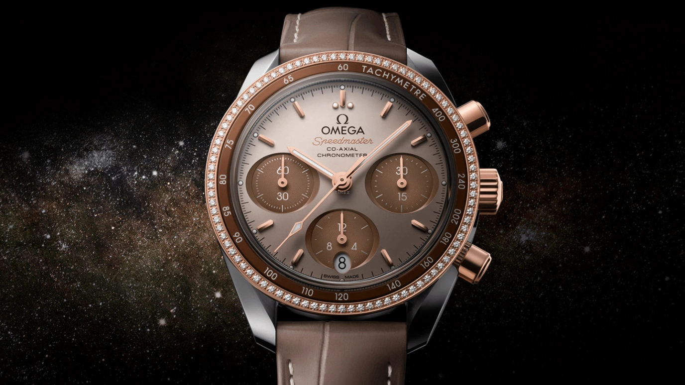 Omega,Speedmaster (Non-Moonwatch) 38mm,38mm,Sedna Gold,Stainless Steel,Beige,Automatic,Chronograph,Date,Co-Axial Escapement,Column Wheel,52hours,In-house Caliber,324,324.28.38.50.02.002