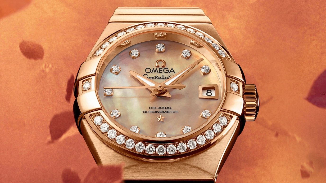 Omega,Constellation 27mm,27mm,Red Gold,Brown,Automatic,Date,Co-Axial Escapement,123,123.55.27.20.57.001