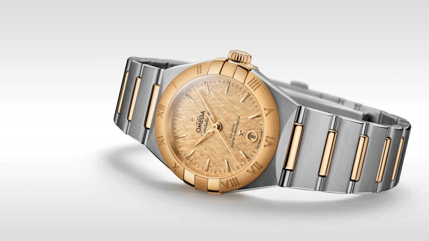 Omega,Constellation 29mm,29mm,Yellow Gold,Stainless Steel,Champagne,Automatic,Date,Co-Axial Escapement,131,131.20.29.20.08.001