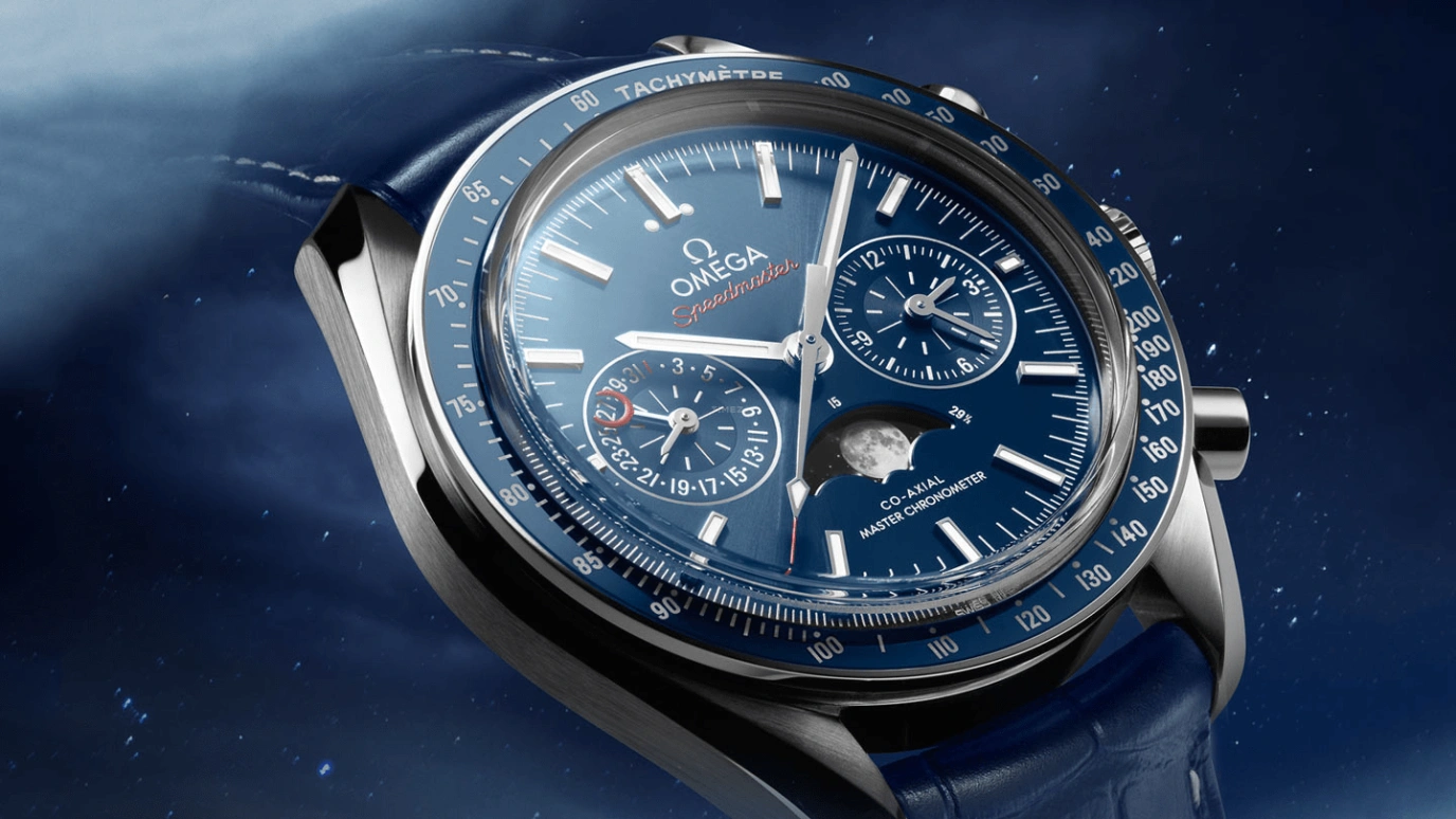 Omega,Speedmaster Moonwatch 44.25mm,44.25mm,Ceramic,Stainless Steel,Blue,Automatic,Chronograph,Moonphase,Day,304,304.33.44.52.03.001