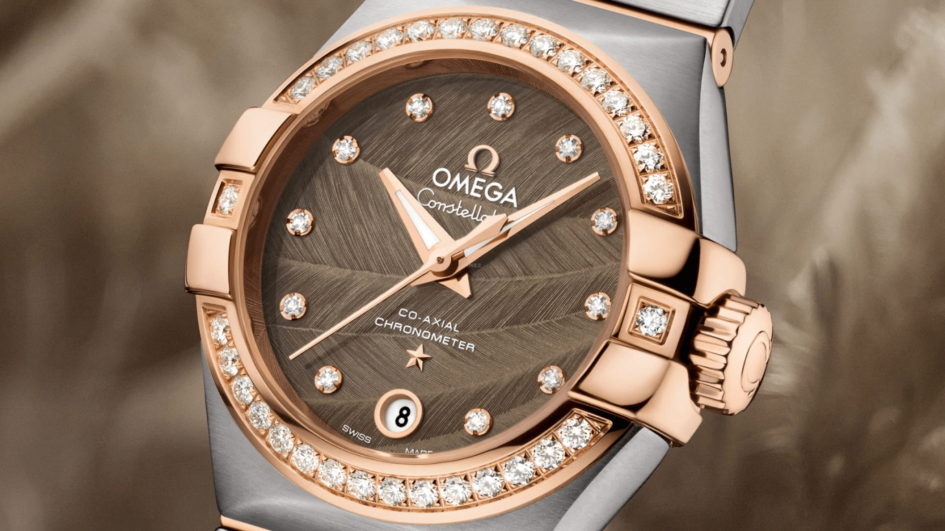 Omega,Constellation 27mm,27mm,Red Gold,Stainless Steel,Brown,Automatic,Date,Zodiac Indications,Co-Axial Escapement,123,123.25.27.20.63.001