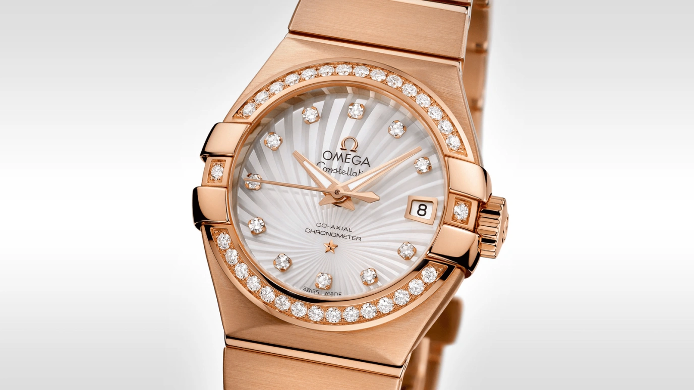 Omega,Constellation 27mm,27mm,Red Gold,White,Automatic,Date,Co-Axial Escapement,123,123.55.27.20.55.001