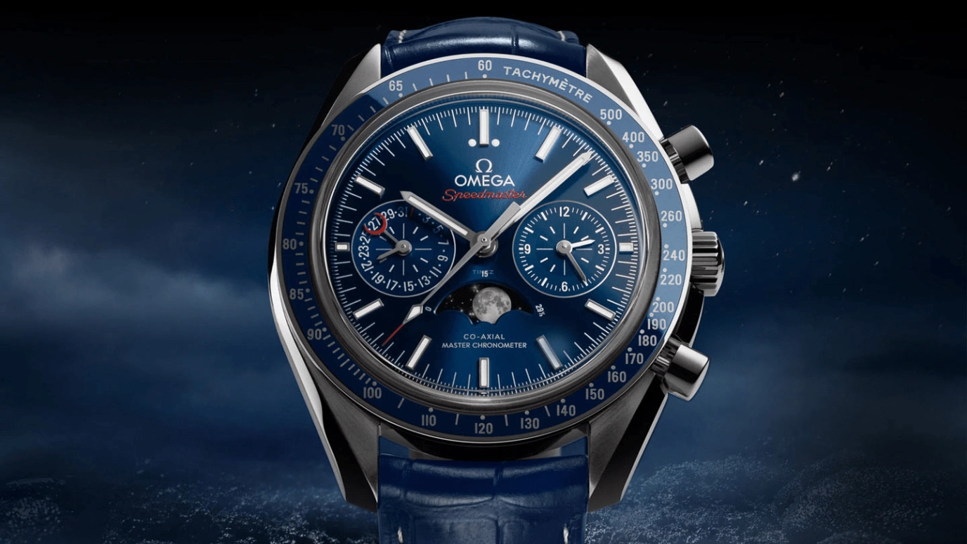 Omega,Speedmaster Moonwatch 44.25mm,44.25mm,Ceramic,Stainless Steel,Blue,Automatic,Chronograph,Moonphase,Day,304,304.33.44.52.03.001