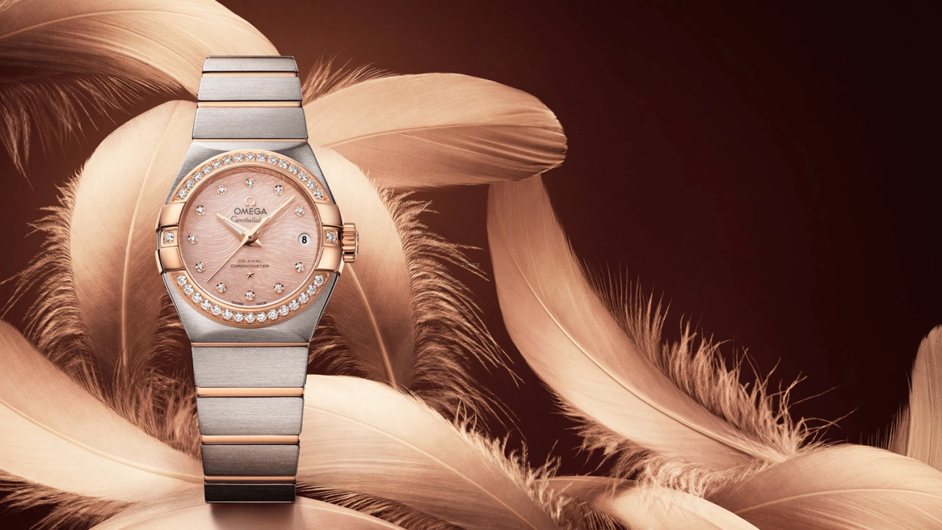 Omega,Constellation 27mm,27mm,Red Gold,Stainless Steel,Pink,Automatic,Date,Zodiac Indications,Co-Axial Escapement,123,123.25.27.20.57.004