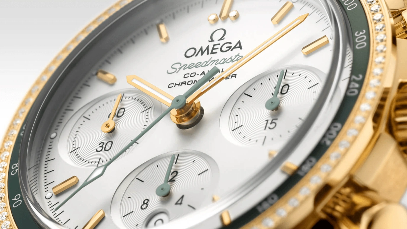 Omega,Speedmaster (Non-Moonwatch) 38mm,38mm,Yellow Gold,Silver,Automatic,Chronograph,Date,Co-Axial Escapement,Column Wheel,52hours,In-house Caliber,324,324.68.38.50.02.004