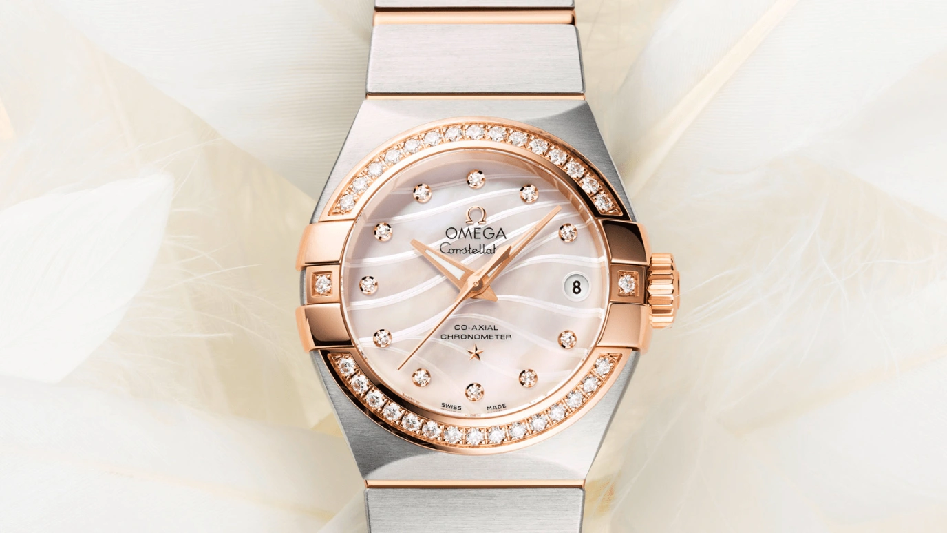 Omega,Constellation 27mm,27mm,Red Gold,Stainless Steel,White,Automatic,Date,Zodiac Indications,Co-Axial Escapement,123,123.25.27.20.55.005