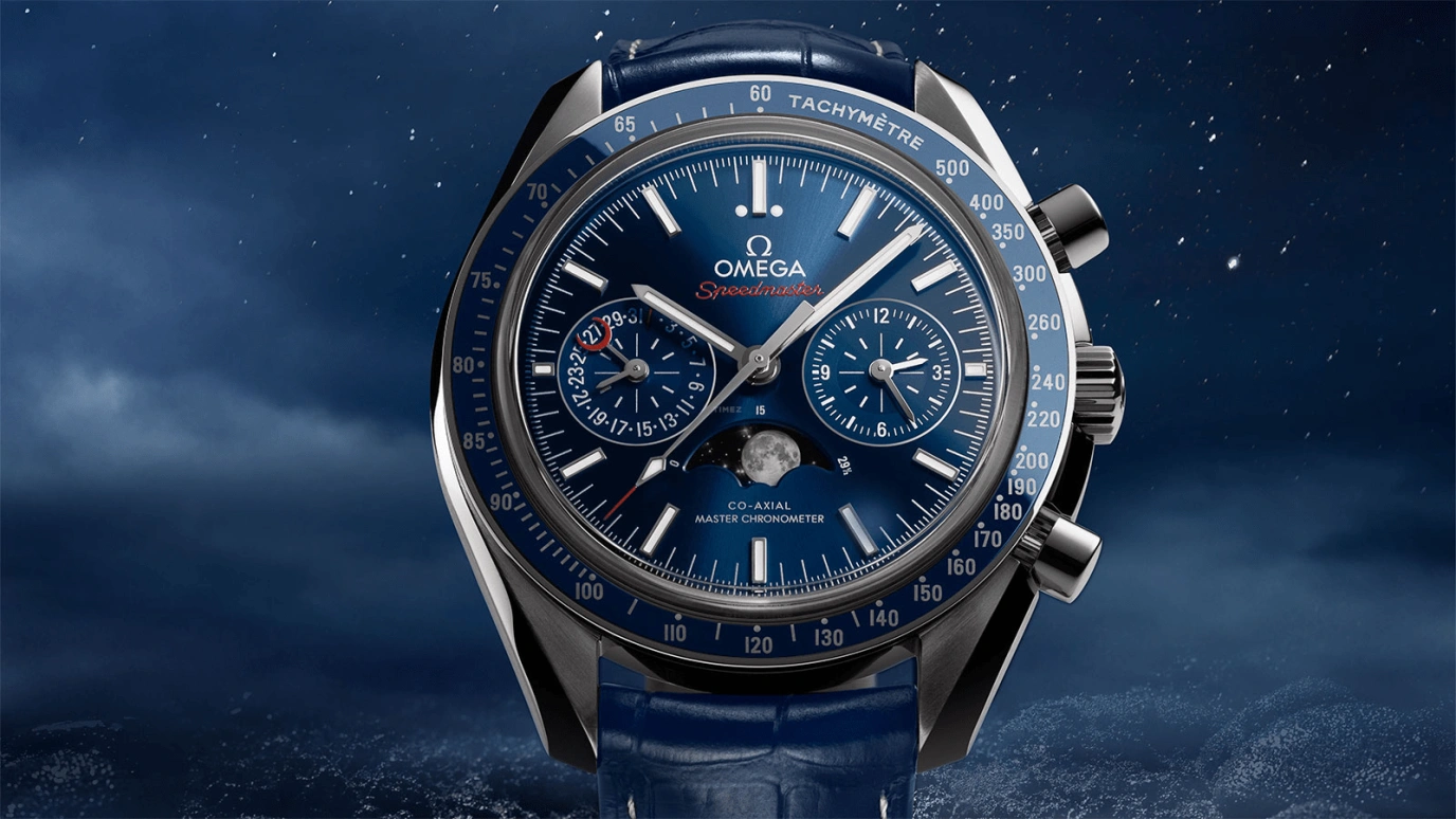 Omega,Speedmaster Moonwatch 44.25mm,44.25mm,Ceramic,Stainless Steel,Blue,Automatic,Chronograph,Moonphase,Day,304,304.33.44.52.03.001