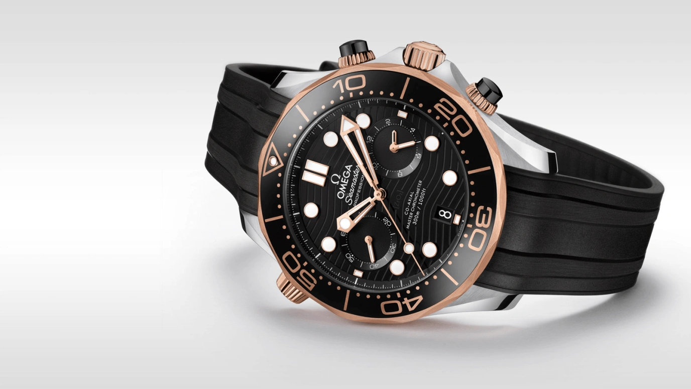 Omega,Seamaster Diver 300M 44mm,44mm,Sedna Gold,Stainless Steel,Black,Automatic,Chronograph,Date,Co-Axial Escapement,Column Wheel,60hours,In-house Caliber,210,210.22.44.51.01.001