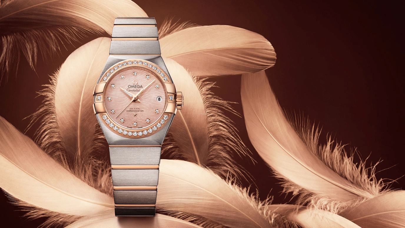 Omega,Constellation 27mm,27mm,Red Gold,Stainless Steel,Pink,Automatic,Date,Zodiac Indications,Co-Axial Escapement,123,123.25.27.20.57.004