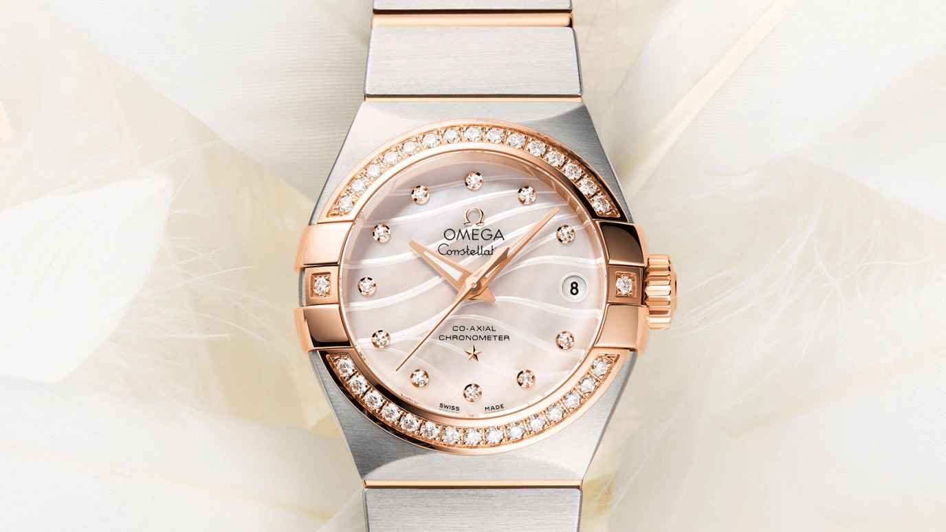 Omega,Constellation 27mm,27mm,Red Gold,Stainless Steel,White,Automatic,Date,Zodiac Indications,Co-Axial Escapement,123,123.25.27.20.55.005