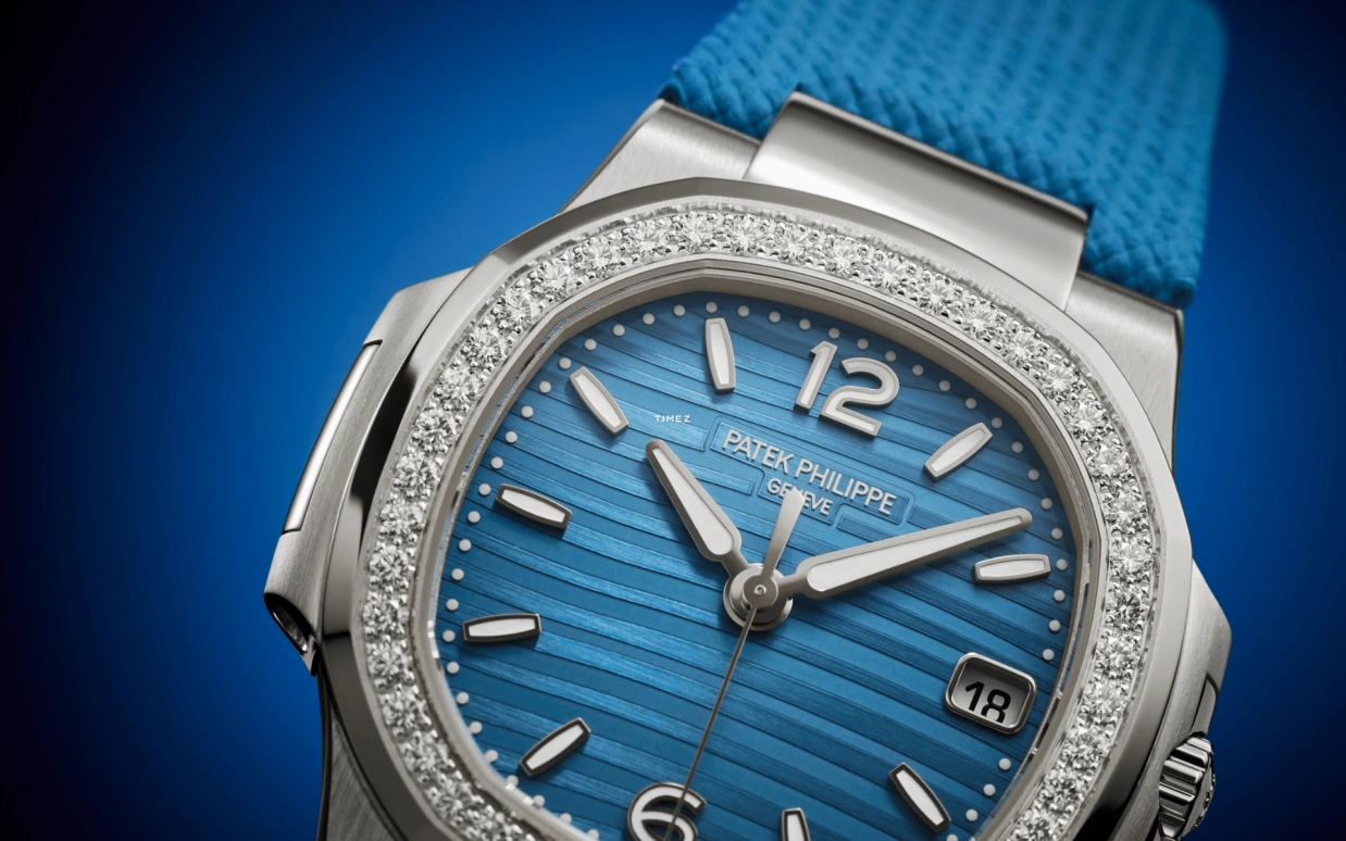 Patek Philippe,Nautilus 32mm,32mm,White Gold,Sky Blue,Quartz,Day,In-house Caliber,7010G,7010G-013