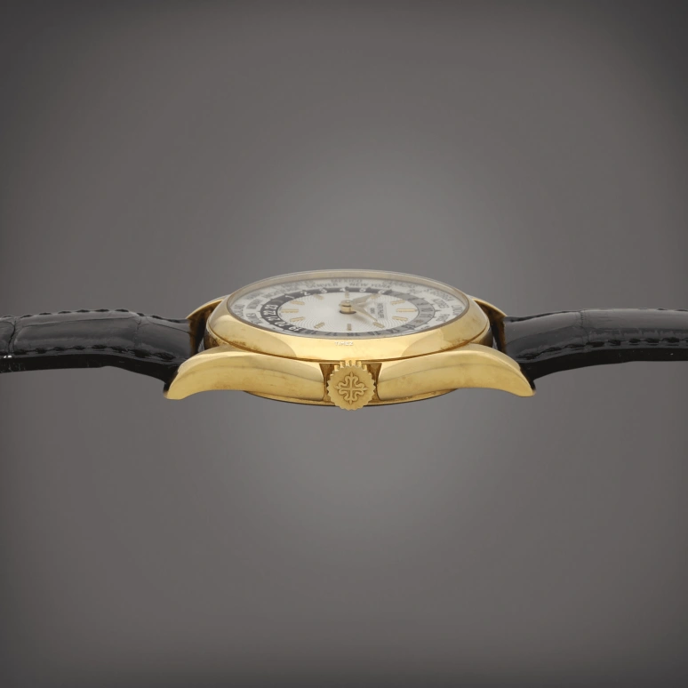 Patek Philippe,Complications 37mm,37mm,Yellow Gold,Silver White,Automatic,World Time,Day / Night Indication,5110J,5110J-001