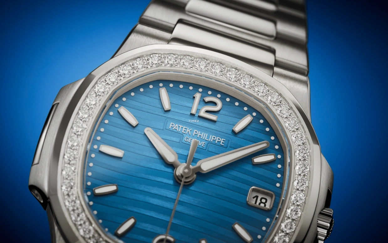 Patek Philippe,Nautilus 32mm,32mm,White Gold,Sky Blue,Quartz,Day,In-house Caliber,7010,7010/1G-013