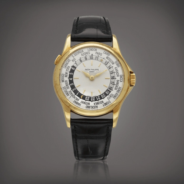 Patek Philippe,Complications 37mm,37mm,Yellow Gold,Silver White,Automatic,World Time,Day / Night Indication,5110J,5110J-001