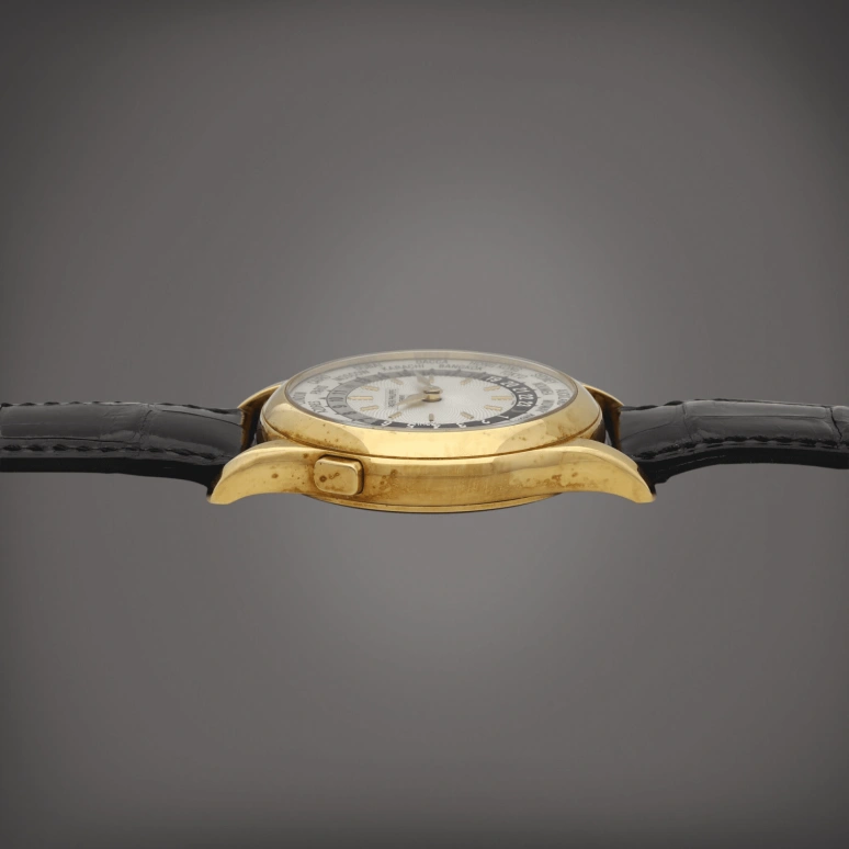 Patek Philippe,Complications 37mm,37mm,Yellow Gold,Silver White,Automatic,World Time,Day / Night Indication,5110J,5110J-001