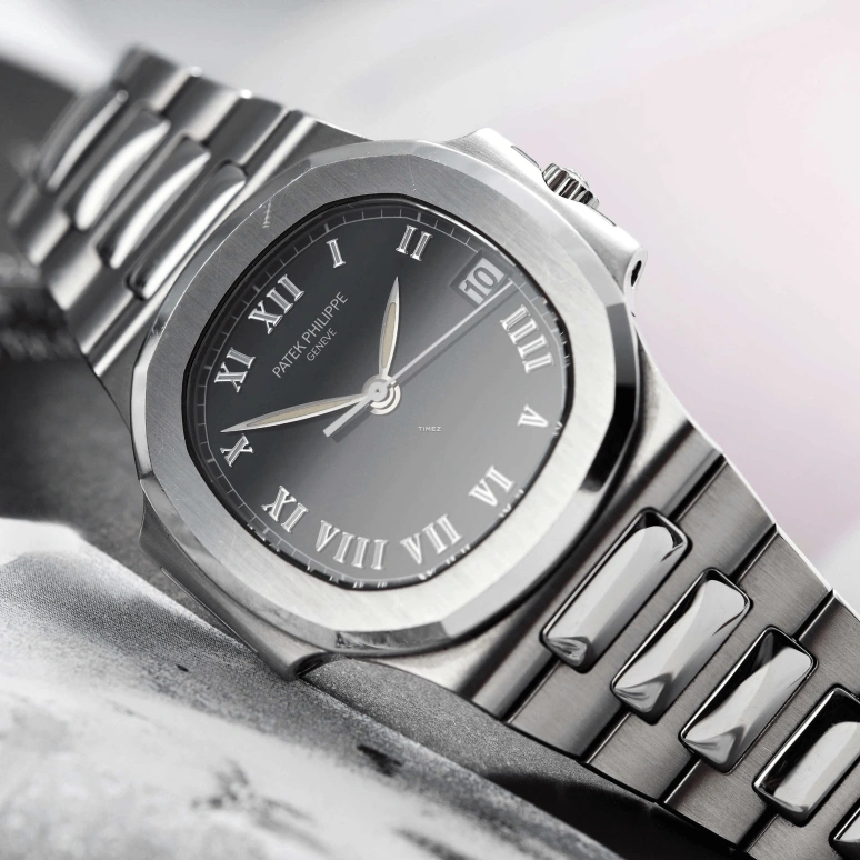 Patek Philippe,Nautilus 37mm,37mm,Stainless Steel,Black,Automatic,Day,In-house Caliber,3800,3800/1A-001