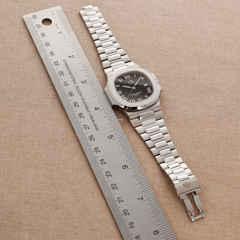 Patek Philippe,Nautilus 40mm,40mm,Stainless Steel,Black,Automatic,Day,Power Reserve Indicator,3710,3710/1A-001