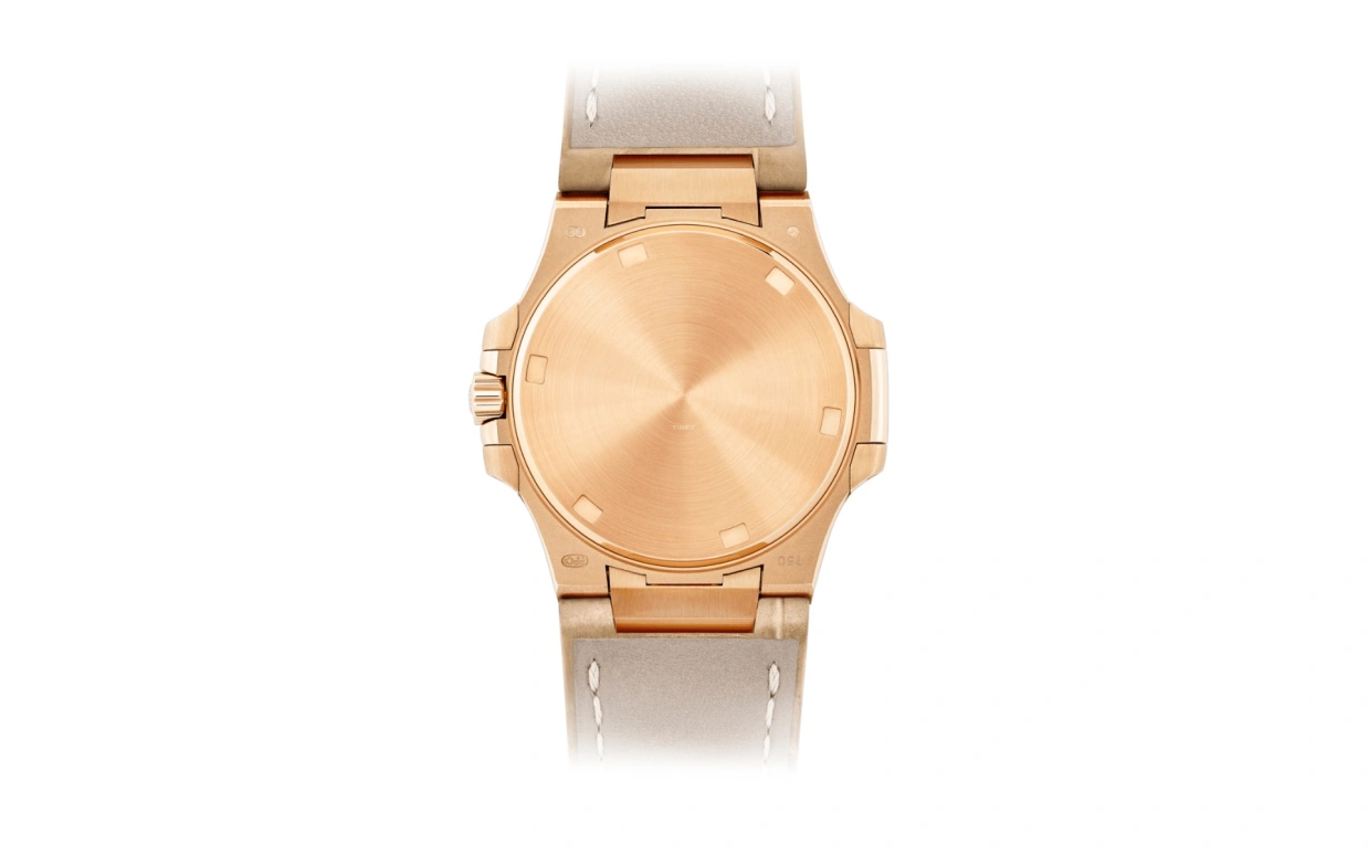 Patek Philippe,Nautilus 32mm,32mm,Rose Gold,White,Quartz,Day,In-house Caliber,7010R,7010R-011