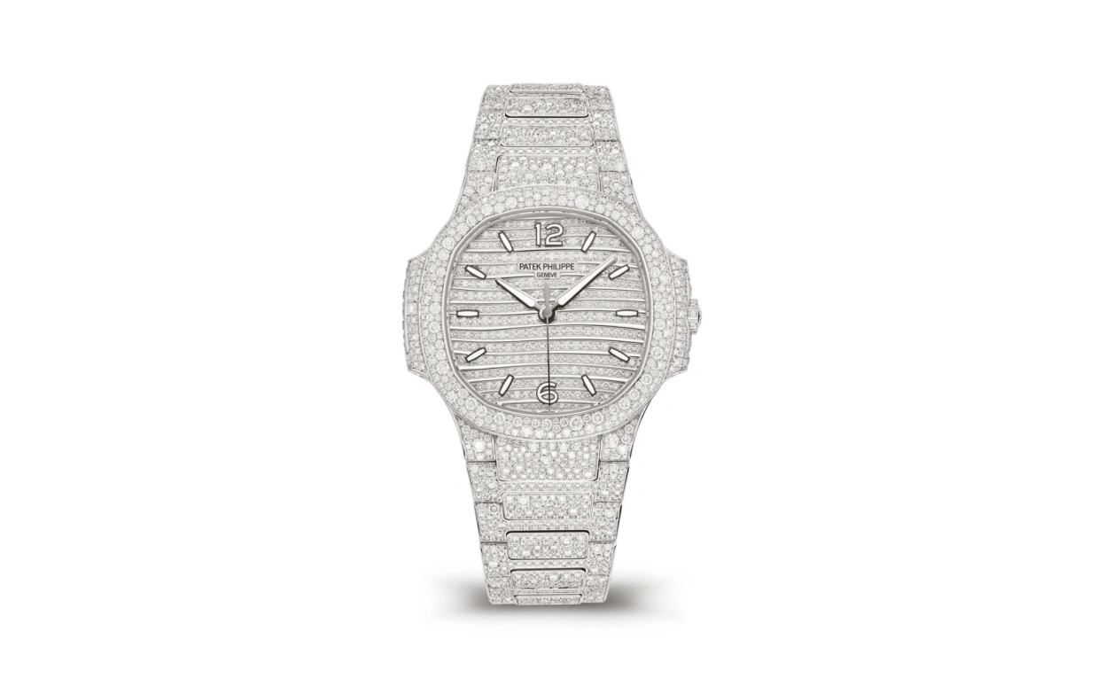 Patek Philippe,Nautilus 35.20mm,35.20mm,White Gold,Silver,White,Automatic,45hours,In-house Caliber,Victoria Beckham,Posh Spice,7118,7118/1450G-001