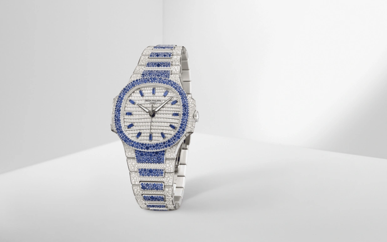 Patek Philippe,Nautilus 35.20mm,35.20mm,White Gold,Silver White,Automatic,45hours,In-house Caliber,7118,7118/1451G-001
