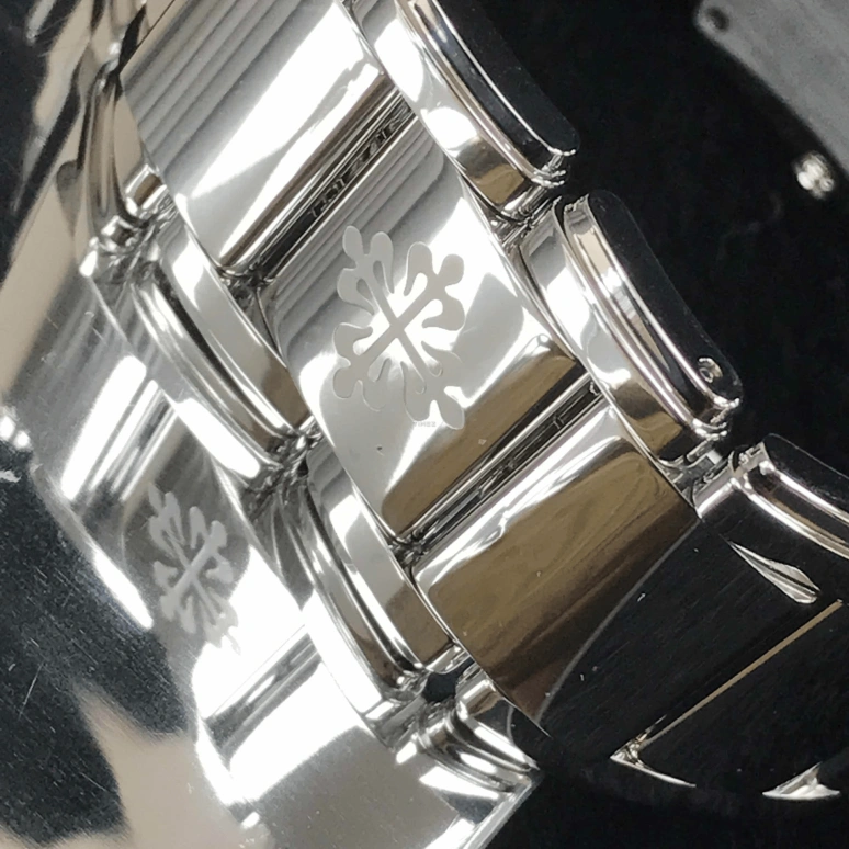 Patek Philippe,Twenty~4 25x30mm,25x30mm,Stainless Steel,Black,Quartz,In-house Caliber,Sapphire,4910,4910/10A-001